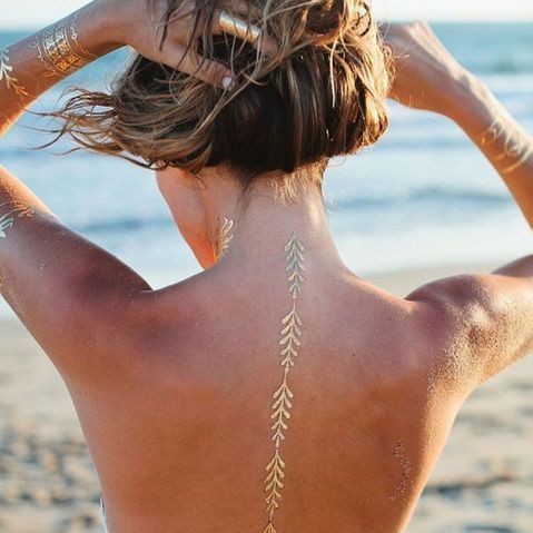 Les 100 plus beaux tatouages dos femme 14 Les 100 plus beaux tatouages dos femme 14