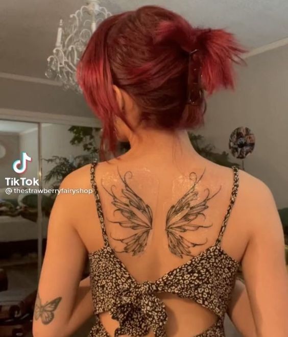 Les 100 plus beaux tatouages dos femme 92