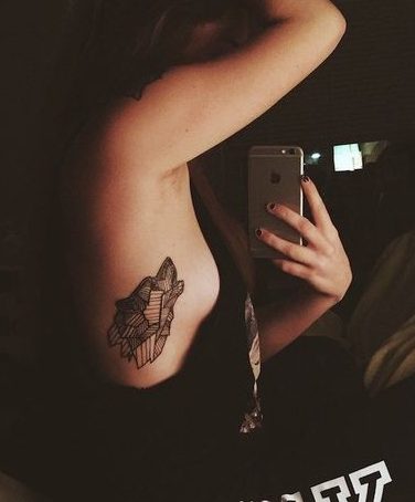 Les 100 plus beaux tatouages loup pour femme 99