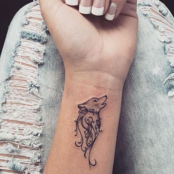 Les 100 plus beaux tatouages loup pour femme 100