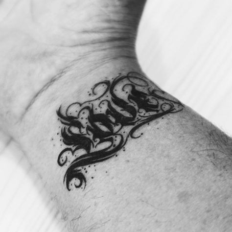 Les 50 plus beaux tatouages calligraphie 44