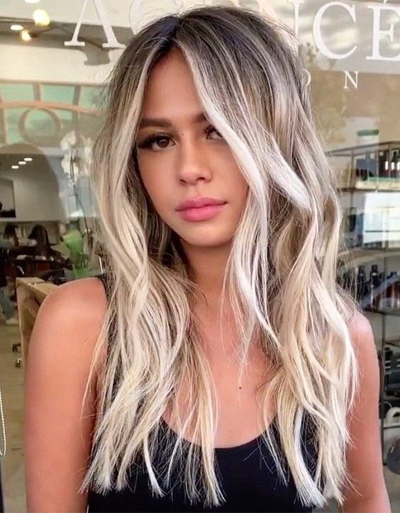 32 Coupes de cheveux pour affiner un visage rond 32