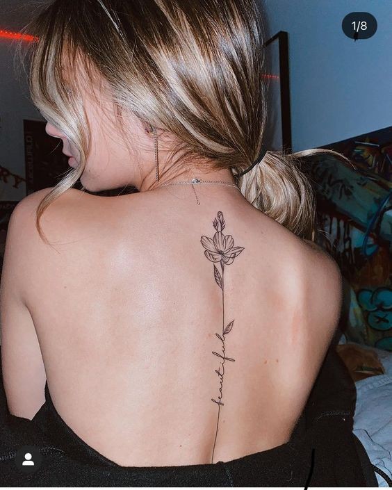 44 tatouages ​​dos qui rendent une femme irrésistible 38