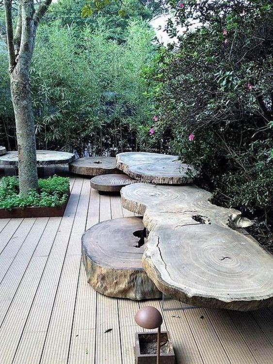 28 idées pour décorer votre jardin avec des troncs d'arbre 7