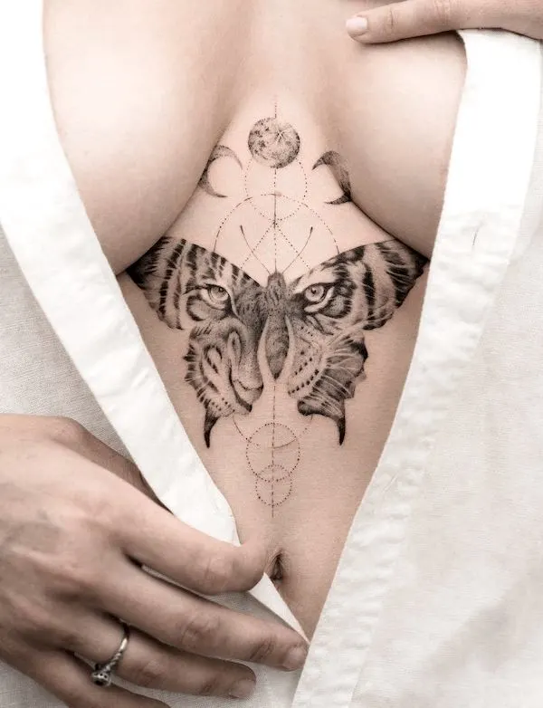 Eyes of a tiger moth tattoo by @tritoan_7th - badass tattoo for women