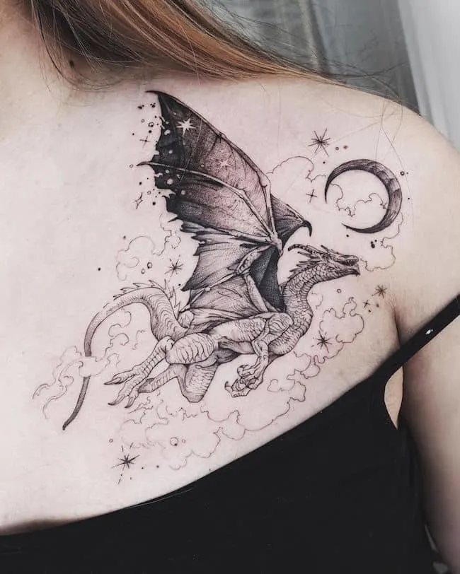 50 tatouages étonnants pour femmes, dignes d'un dur à cuire 22 Dragon in the starry night tattoo by @masa__island - Elegant and Badass Dragon Tattoos For Women with Meaning