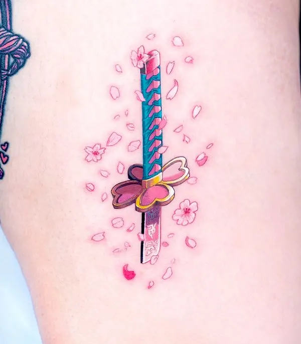 Cherry blossoms and samurai sword tattoo by @coldchillchild