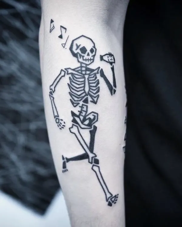 Devil on the run - a playful skeleton tattoo by @greemtattoo