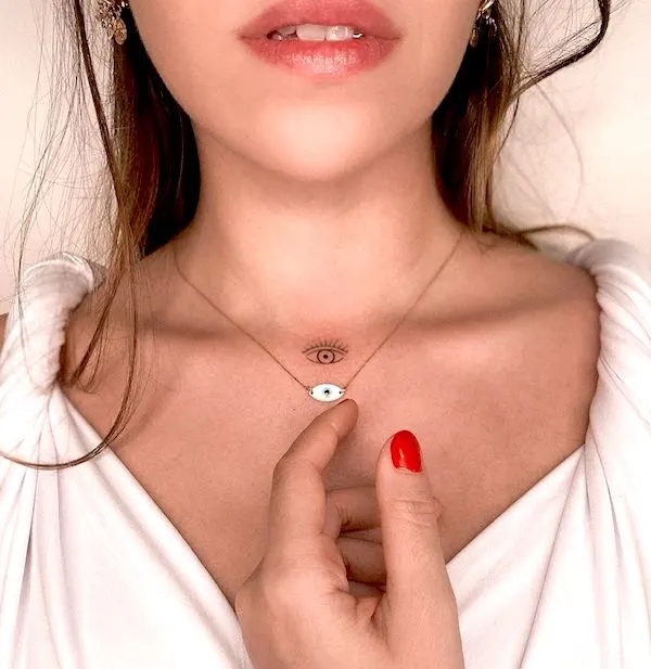 50 tatouages étonnants pour femmes, dignes d'un dur à cuire 45 A dainty evil eye tattoo by @renan.sampaio