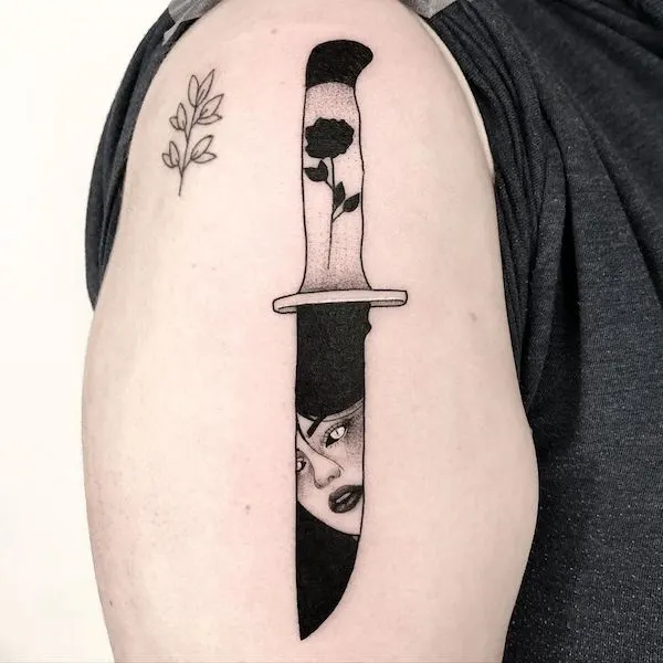 Face in the blade sleeve tattoo by @sync.ink