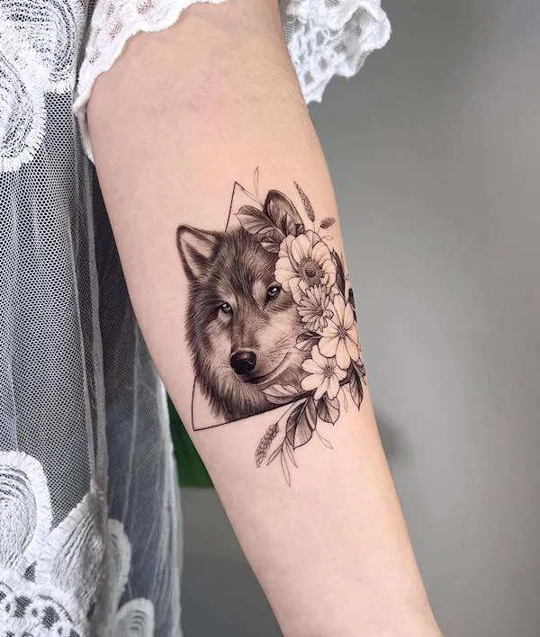 Wolf inner arm tattoo by @okeanos.tattoo