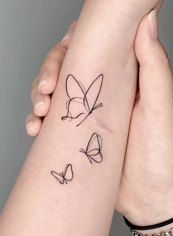 Minimalist butterfly forearm tattoo by @tattooist_sunmoon