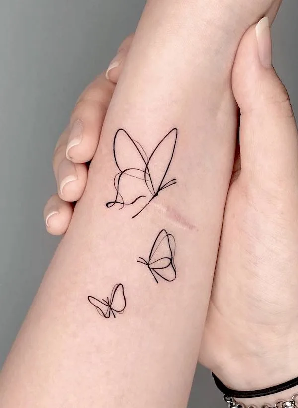 75 superbes tatouages de bras pour femmes avec signification 12 Minimalist butterfly forearm tattoo by @tattooist_sunmoon