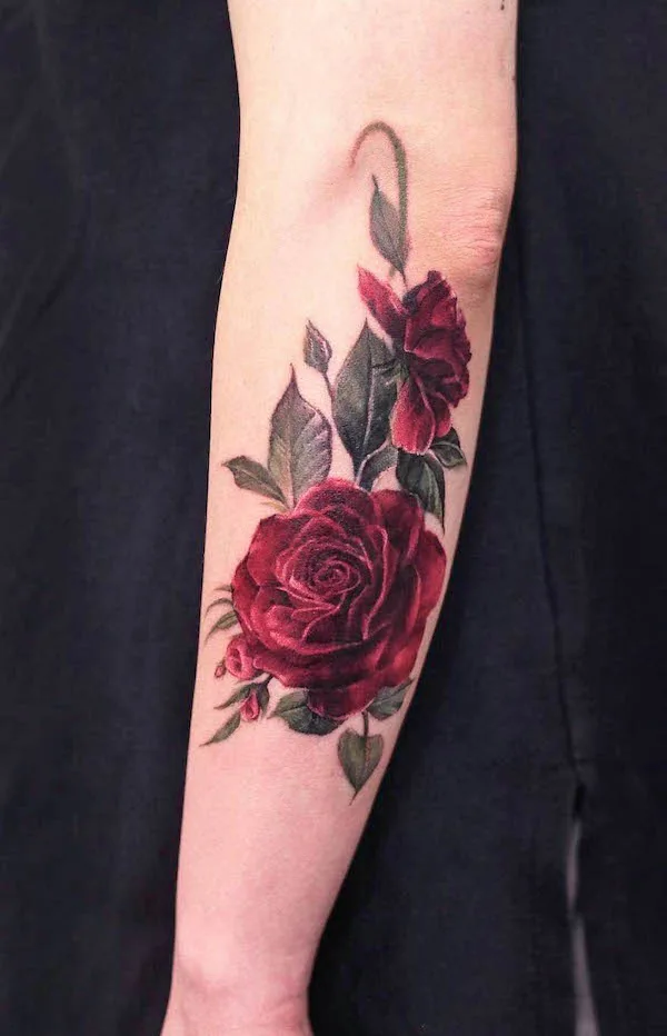 Stunning rose cover-up forearm tattoo by @vandal_tattoo
