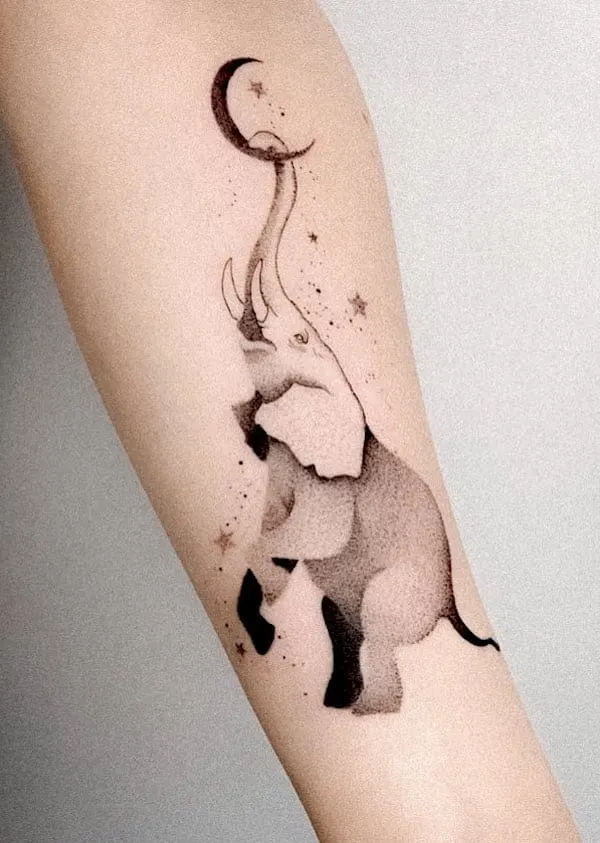 Whimsical elephant arm tattoo for women by @miki_tatuuje