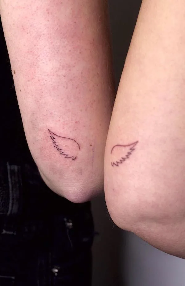 75 superbes tatouages de bras pour femmes avec signification 53 Matching wings elbow tattoo by @alunar.ink