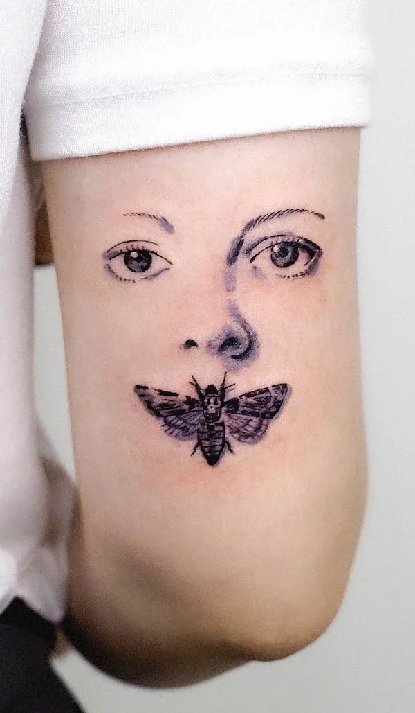 75 superbes tatouages de bras pour femmes avec signification 56 The silence of the lamb back of the arm tattoo by @soosoo.tattoo