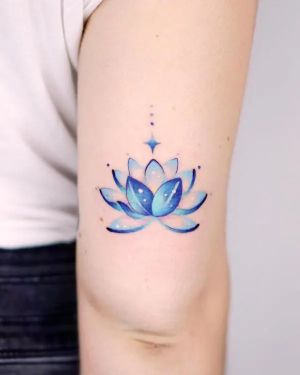 Blue lotus on the back of the arm tattoo by @charming_tattoo