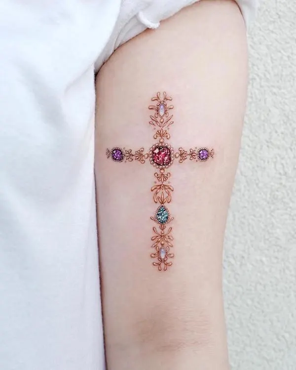 75 superbes tatouages de bras pour femmes avec signification 66 Gemstone cross arm tattoo by @tattooist_solar