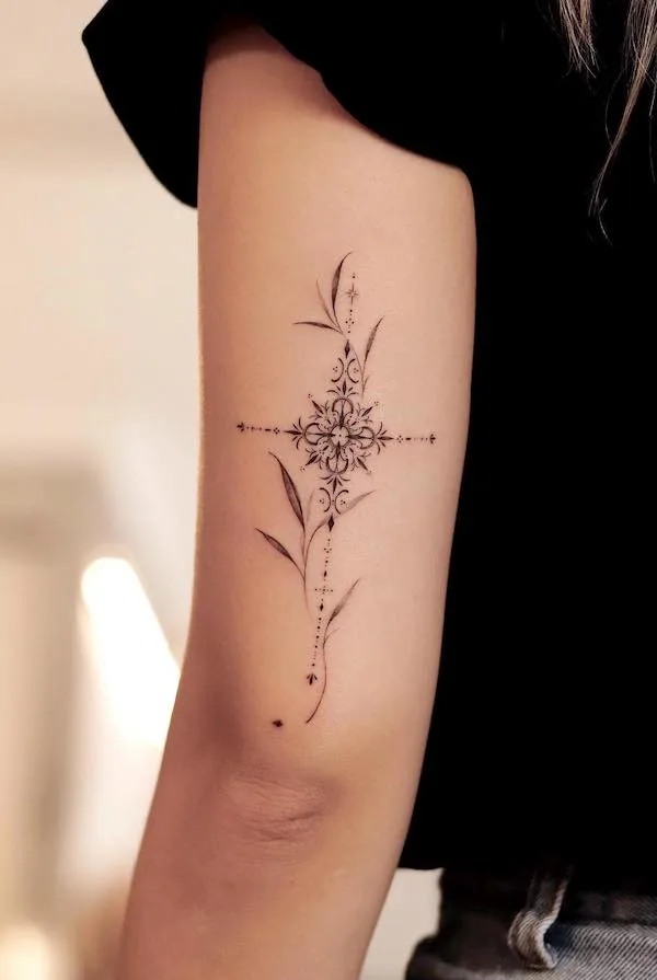 Ornamental cross back of the arm tattoo by @sukza__art