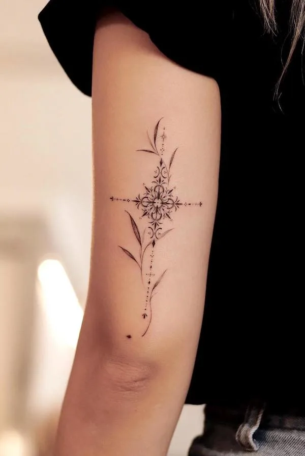 75 superbes tatouages de bras pour femmes avec signification 67 Ornamental cross back of the arm tattoo by @sukza__art