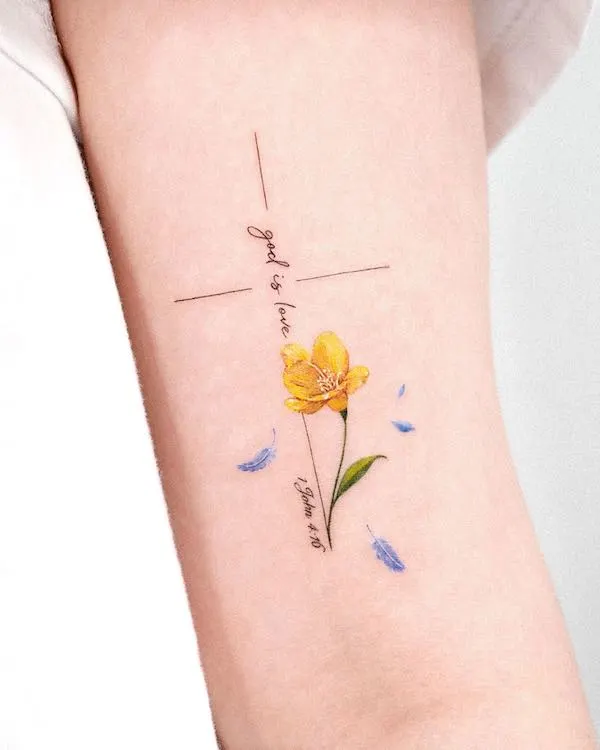 Cross with flower and quote by @tattooist_solar