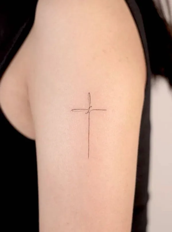 75 superbes tatouages de bras pour femmes avec signification 71 Simple cross outer arm tattoo by @handitrip