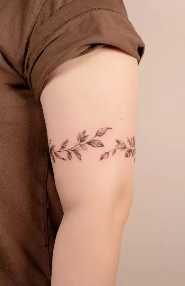 Botanical arm band tattoo by @handitrip