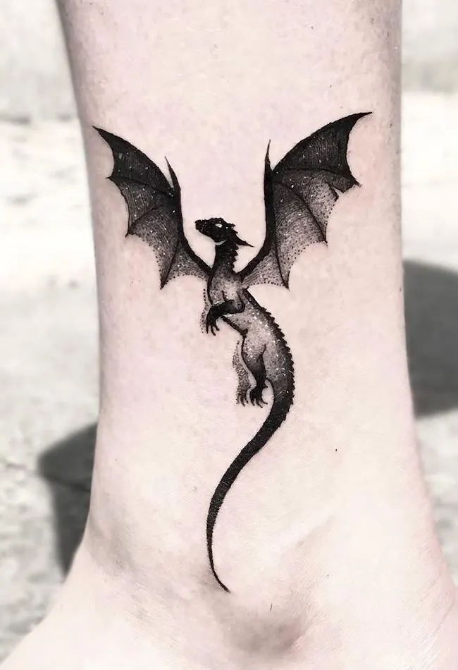 Black dragon ankle tattoo by @pszyps.tattoo