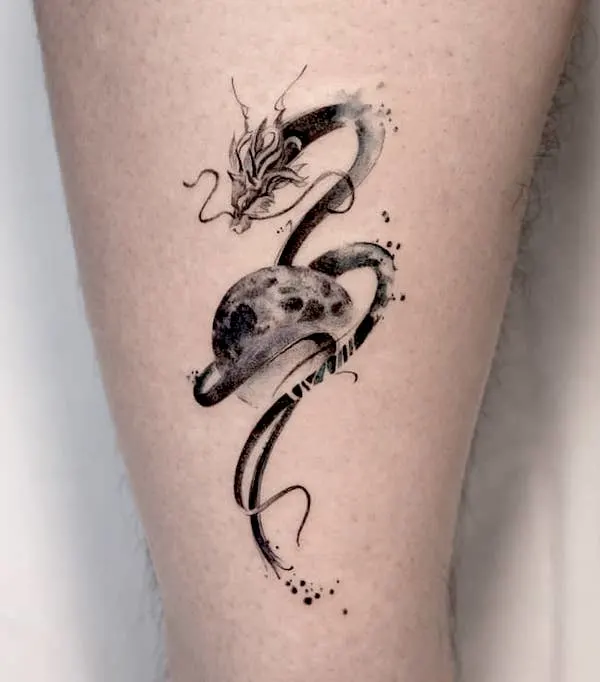 Dragon and moon tattoo by @handitrip