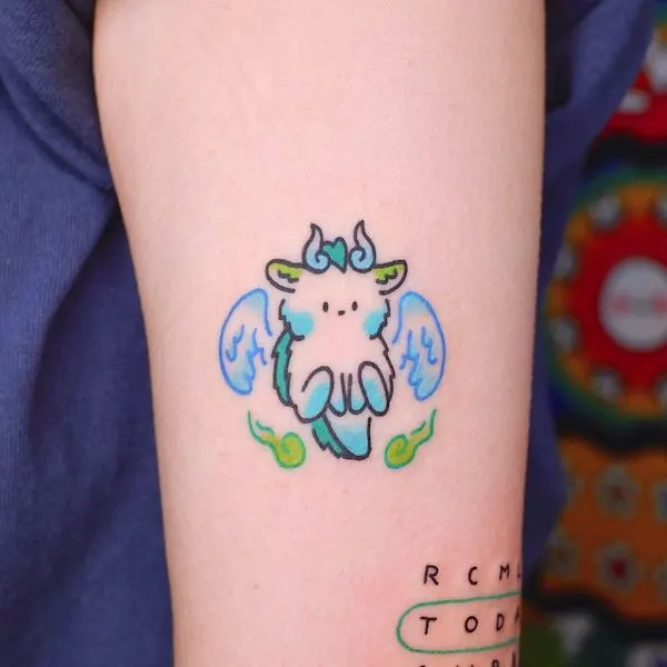Cute small cartoon dragon tattoo by @xinamon_tattoo
