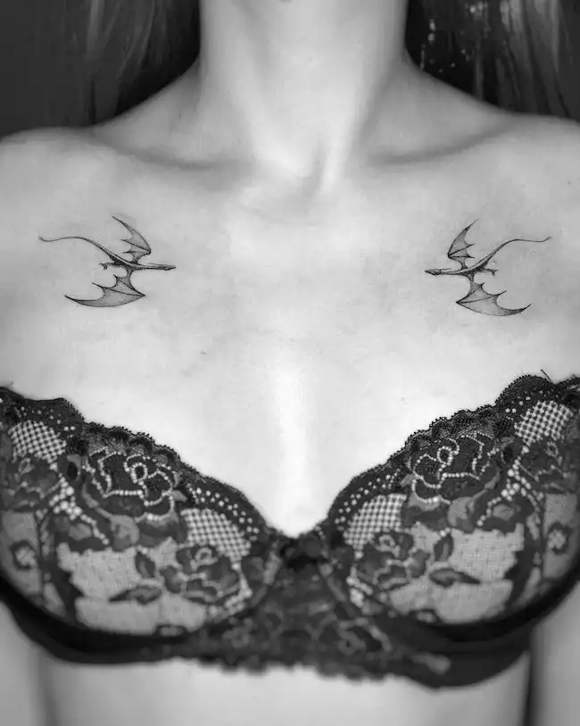 Symmetrical dragon chest tattoos by @alina_molido - Elegant and Badass Dragon Tattoos For Women with Meaning