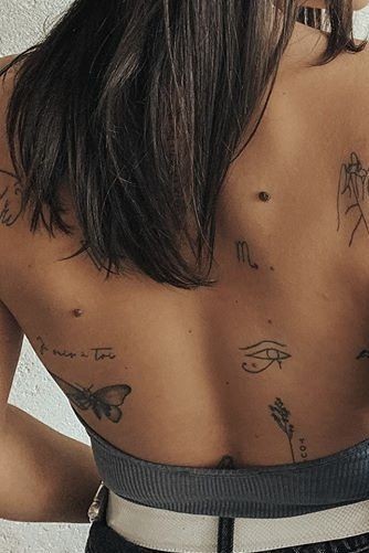 14 Tatouages minimalistes féminins pour le dos 8