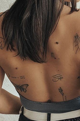 14 Tatouages minimalistes féminins pour le dos 8 14 Tatouages minimalistes féminins pour le dos 8