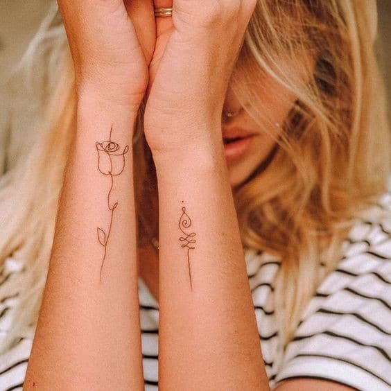 22 Tatouages minimalistes bras pour femme 5