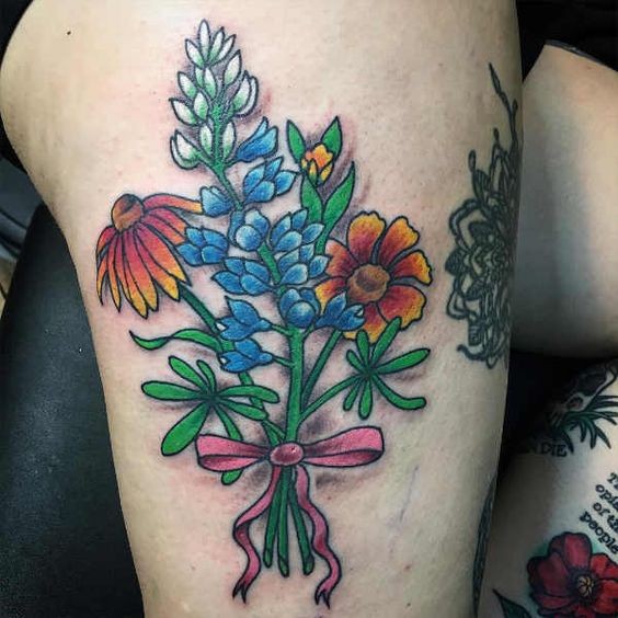 100 top idées de tatouages cuisse pour femme 2