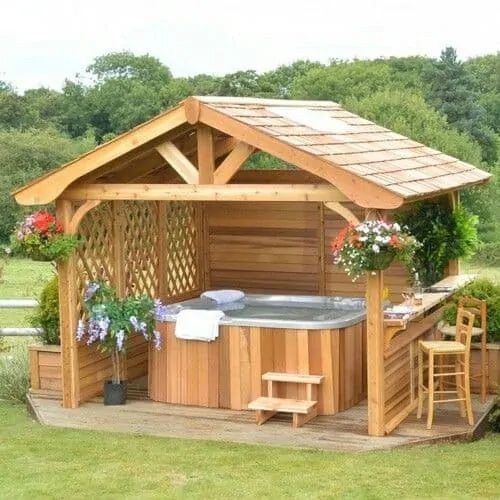 25 idées de tables de jardin avec bancs et toits en bois 13
