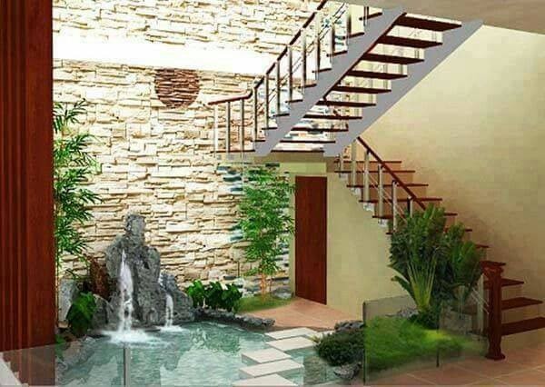 12 idées pour embellir la zone sous les escaliers 8