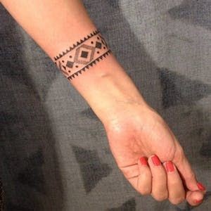 34 top idées de tatouages maori avant-bras 17