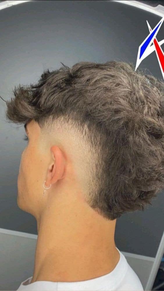 33 Coupes taper mood fade mi-long homme 2023 18 33 Coupes taper mood fade mi-long homme 2023 18